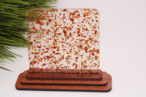 Scratch and Dent: Orange Glitter Flakes - 1/8" Clear Cast Acrylic Sheet